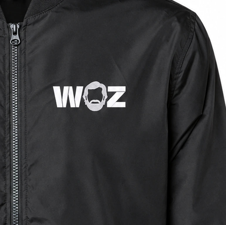 WOZ Bomber Jacket - chest artwork and zipper, cropped from the existing catalog image.
