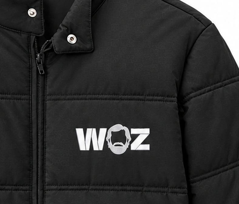 WOZ × TravisMathew Cold Bay Jacket - chest artwork, cropped from the existing catalog image.