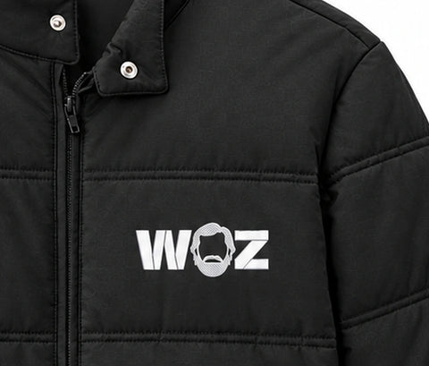 WOZ × TravisMathew Cold Bay Jacket - chest artwork, cropped from the existing catalog image.