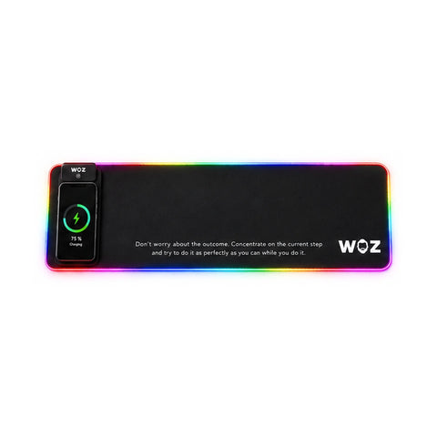 WOZ wireless-charging desk mat with RGB edge lighting. Product render. Phone shown for demonstration only; not included.